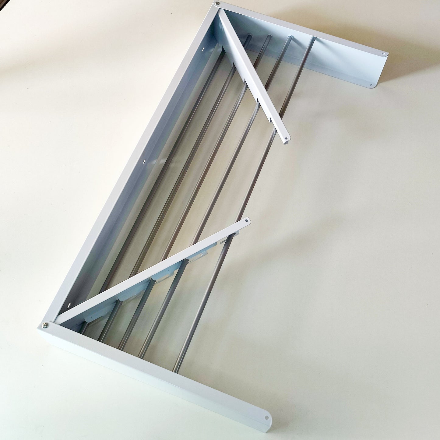 Retractable Wall Mounted Laundry Drying Rack by Matrix